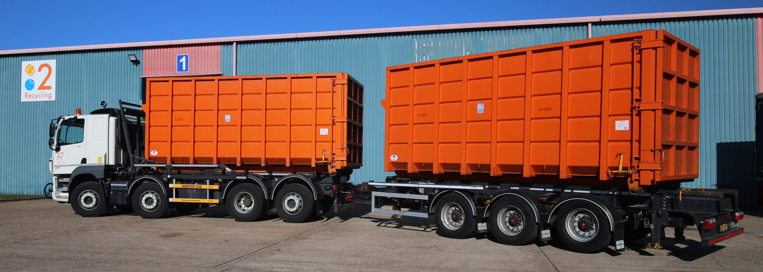 RoRo Skips being transported for scrap metal recycling